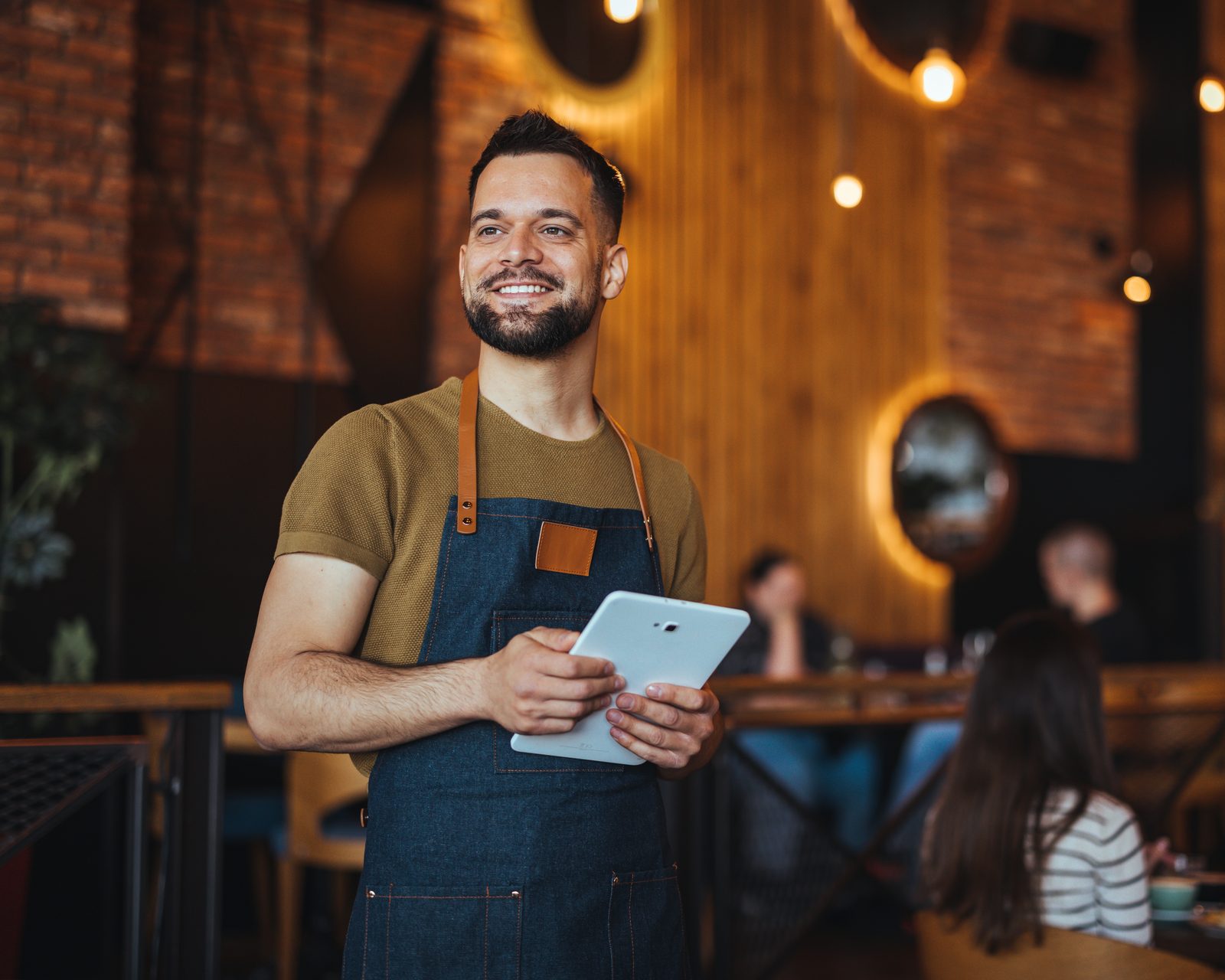Small business owner running their venue